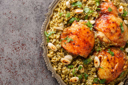 Groats Freekeh with chicken is such a well rounded Arabic meal closeup in the plate on the table. Horizontal top view from aboveの写真素材