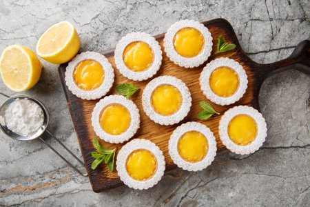 Amazing Lemon Curd Cookies soft bright, and refreshing closeup on wooden board on the table....