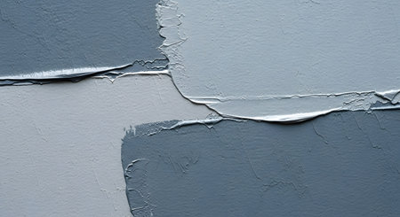 Paint peeling off the wall with a spatula. Abstract background.の素材