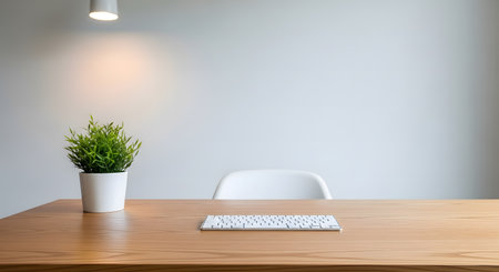 Wooden office desk with computer and plant on it. 3D renderingの素材