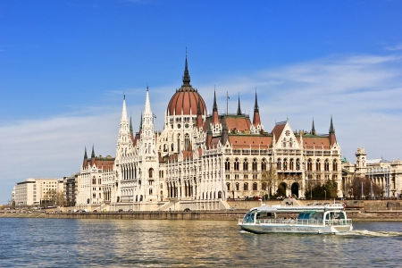 Budapest, Hungary - March 26, 2012 - Budapest Parliament, visit the Danube aboard cruise with other ships  Step in front of the Parliament in a sunny dayのeditorial素材