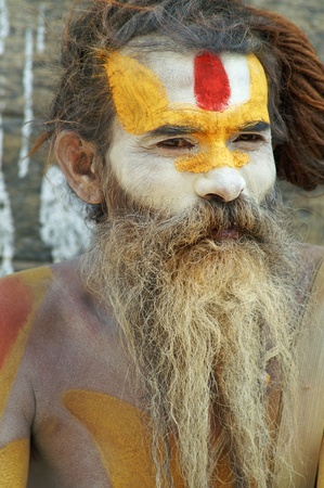 Nepal, Kathmandu Valley, octiber 110, 2010. Shaiva sadhu (holy man) seeking alms in front of a temple (Nepal, Kathmandu)のeditorial素材