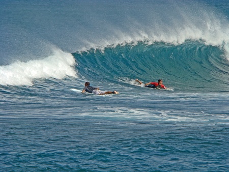 Tenerife, Canarian Island - October 1, 2011: Surfers on the waves actionのeditorial素材
