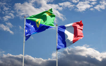 Beautiful national state flags of Christmas Islands and France together at the sky background. 3D artwork concept.の写真素材