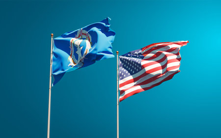 Beautiful national state flags of Northern Mariana Islands and USA together at the sky background....
