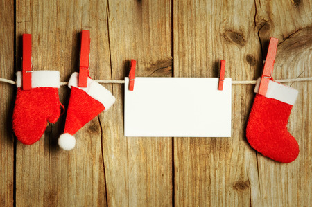 Christmas decoration on clothesline with note of textの写真素材