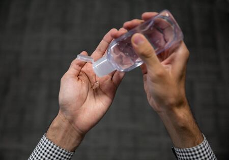 Man with mask and antibacterial gelcoronavirus, covid 19, pandemicの写真素材