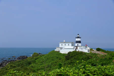 Fuguijiao Lighthouse, 1800s lighthouse at the northern most point of Taiwan coastline.の写真素材