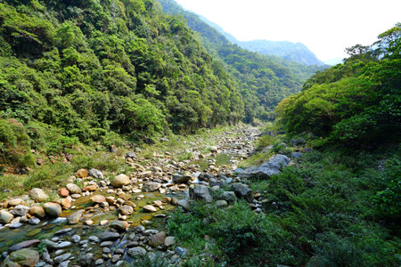 Shakadang Trail, a path carved into the wall of a marble cliff in Taroko National Park, Hualien,...