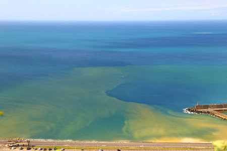 Yin and Yang Sea, a unique blue and yellow colored sea at shuinandong in Taipei Taiwan