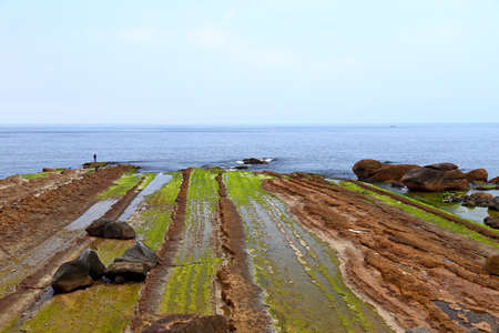 Natural rock formation at Guihou, one of most famous wonders in Wanli, New Taipei City, Taiwan.の写真素材