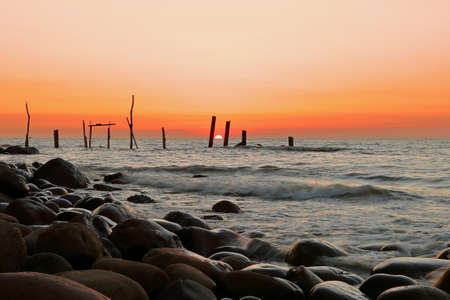 Sunset at Xucuogang Wetlands, heaven for migratory birds in Dayuan District, Taoyuan City, Taiwan.の写真素材