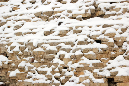 Snow on the stonesの写真素材