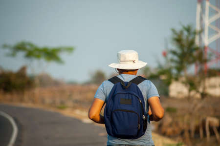 Man on the side of the roadの写真素材