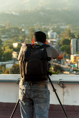 Photographer on his back on rooftop