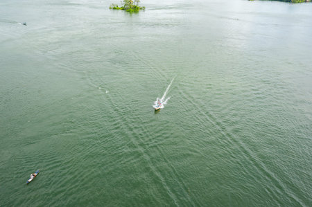 View from above of the flow of the waters of the Rio Dulce