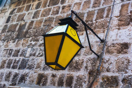 Decorative lampposts on the walls of Dubrovnik's Old Townの写真素材