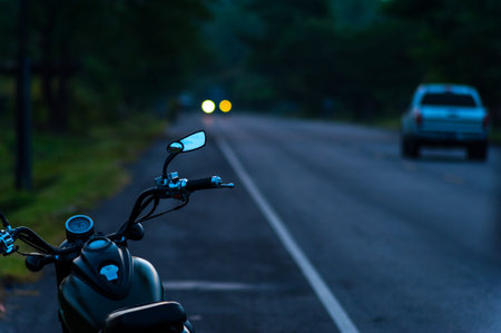 Motorcycle parked on the side of the road in El Salvadorの写真素材