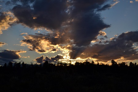 Cloudy Sunset around Uluru (Uluru-Kata Tjuta National Park), Australiaの写真素材