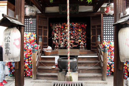 A Japanese shrine in Kyoto. Equipped by lanterns, pillow prayers (not sure how to call it), bells, and so on. Pic was taken in August 2017のeditorial素材