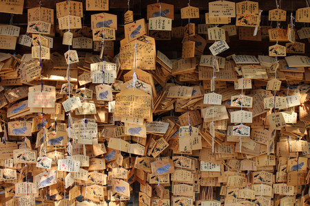 The prayer plaques called "Ema" in Japan. It contains a wish of people. Pic was taken in August 2017. Translation: "Prayers in Japanese"のeditorial素材