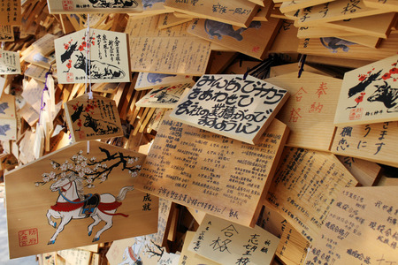 The prayer plaques called "Ema" in Japan. It contains a wish of people. Pic was 
taken in August 2017. Translation: "Prayers in Japanese"のeditorial素材