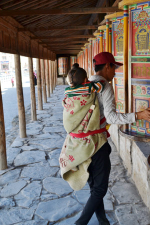 The life around Labrang in Xiahe, Amdo Tibet, China. Pilgrims are everywhere, circumabulating the...
