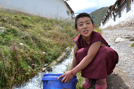 The child monks around Kirti Gompa Monastery in Langmusi, Amdo Tibet, China. Monks are everywhere, as this is the house of them. Pic was taken in September 2017.のeditorial素材