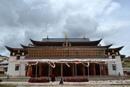 The life around Kirti Gompa Monastery in Langmusi, Amdo Tibet, China. Monks are everywhere, as this is the house of them. Even some of them are chanting mantras. Pic was taken in September 2017.のeditorial素材