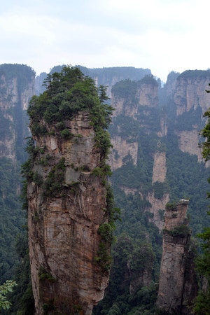 Single rock standing around Wulingyuan Scenic Area. What a dramatic landscape! Pic was taken in Zhangjiajie, September 2017.の写真素材
