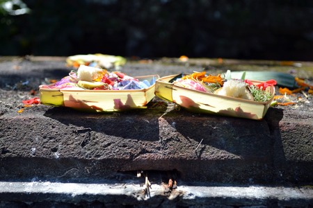 The offering made at one temple in Bali, Indonesia. It's called "Canang sari" in Balinese. Pic was taken in January 2016.の写真素材