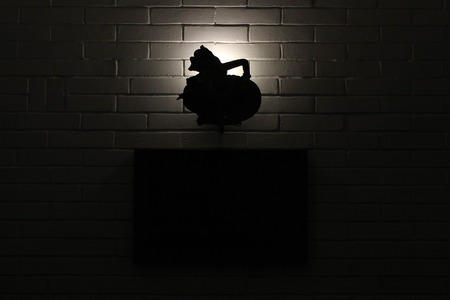 The silhouette of Javanese puppet, called "Wayang". The character is Semar, a divine and wise one. Pic was taken in November 2017.の写真素材