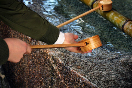 A ritual to purify the pilgrim. In Japanese, it's called "Temizuya" or "Chozuya". Taken in Fukuoka, Japan .の写真素材