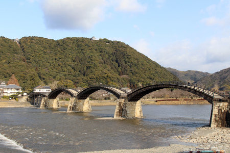 On the way to the iconic Kintai Bridge made of wood. On top of the hill is the Iwakuni Castle. Taken in Yamaguchi Prefecture, February 2018.のeditorial素材