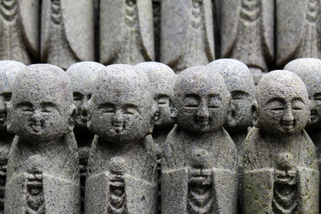 The statues of Buddha "Jizo", that found in many temples in Japan. Taken at Hase-dera temple, Kanagawa - February 2018.のeditorial素材