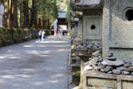 Rocks and toros (lighting) around Futarasan Shrine, in the complex of Toshogu Temple. Taken in Nikko, February 2018.のeditorial素材
