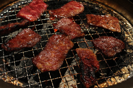 The food served at yakiniku (meaning "grilled meat" or "barbecue") restaurant in Japan. Beef everywhere. Taken in Tokyo, March 2018.のeditorial素材