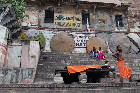 Local people chatting, interacting, hanging around Varanasi ghats in the afternoon. Taken in India, August 2018.のeditorial素材
