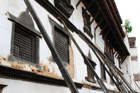 Translation: The windows and supporting woods after the earthquake at Kathmandu Durbar Square. Taken in Nepal, August 2018.のeditorial素材