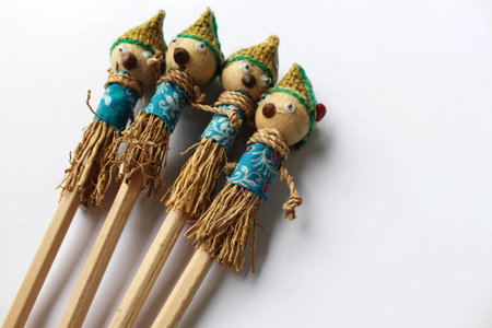 A traditional pencil with a scarecrow as decoration. Exotic.