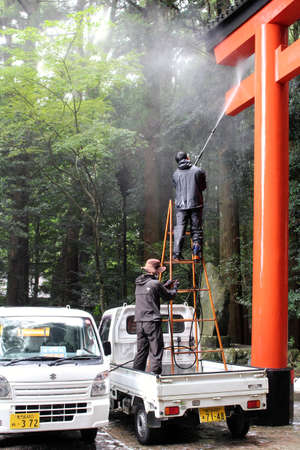 Cleaning the Entrance gate of Kirishima Jingu temple. Taken in August 2019.の写真素材
