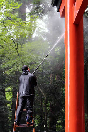 Cleaning the Entrance gate of Kirishima Jingu temple. Taken in August 2019.の写真素材