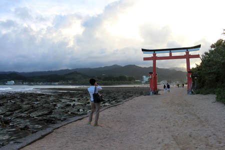 Visiting entrance torii gate of Aoshima Shrine in the island. Located in Miyazaki. Taken in August 2019.のeditorial素材