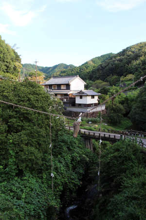 Shimenawa rope hanging in the middle of bridge in Asuka, Nara, Japan. Taken in September 2019.の写真素材