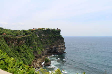 Crashing waves around Uluwatu Temple in Bali. Taken January 2022.の写真素材