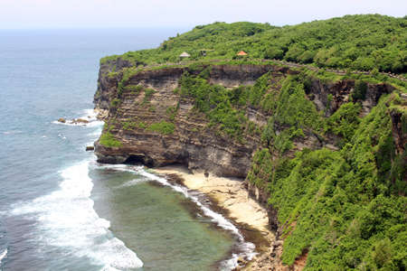 Coral reefs and ocean around Uluwatu Temple in Bali. Taken January 2022.の写真素材