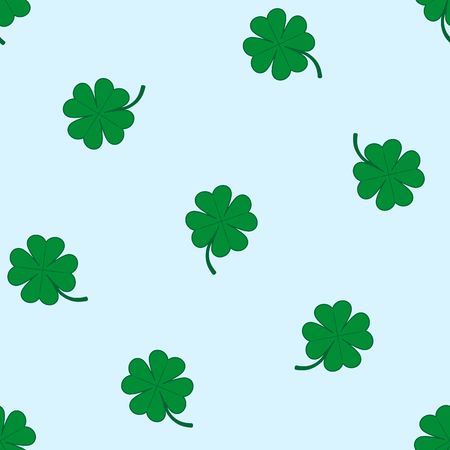 Green four-leaf clovers on blue background. Seamless pattern.のイラスト素材