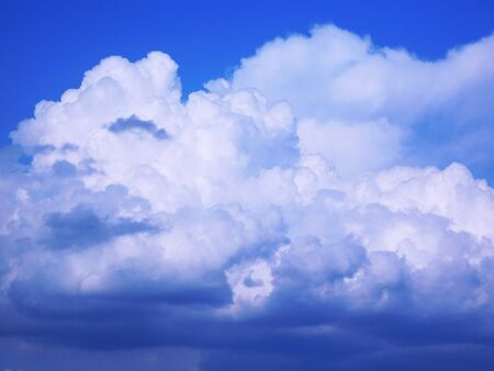 Huge clouds on a blue sky.の写真素材