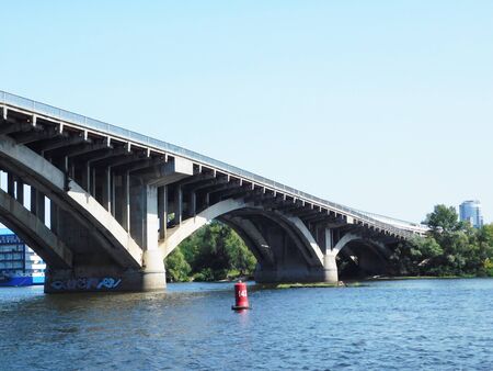 Bottom view of the automobile and metro bridge in Kyiv, Ukraine.の写真素材