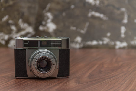 Antique Vintage Old Film Camera on organic background